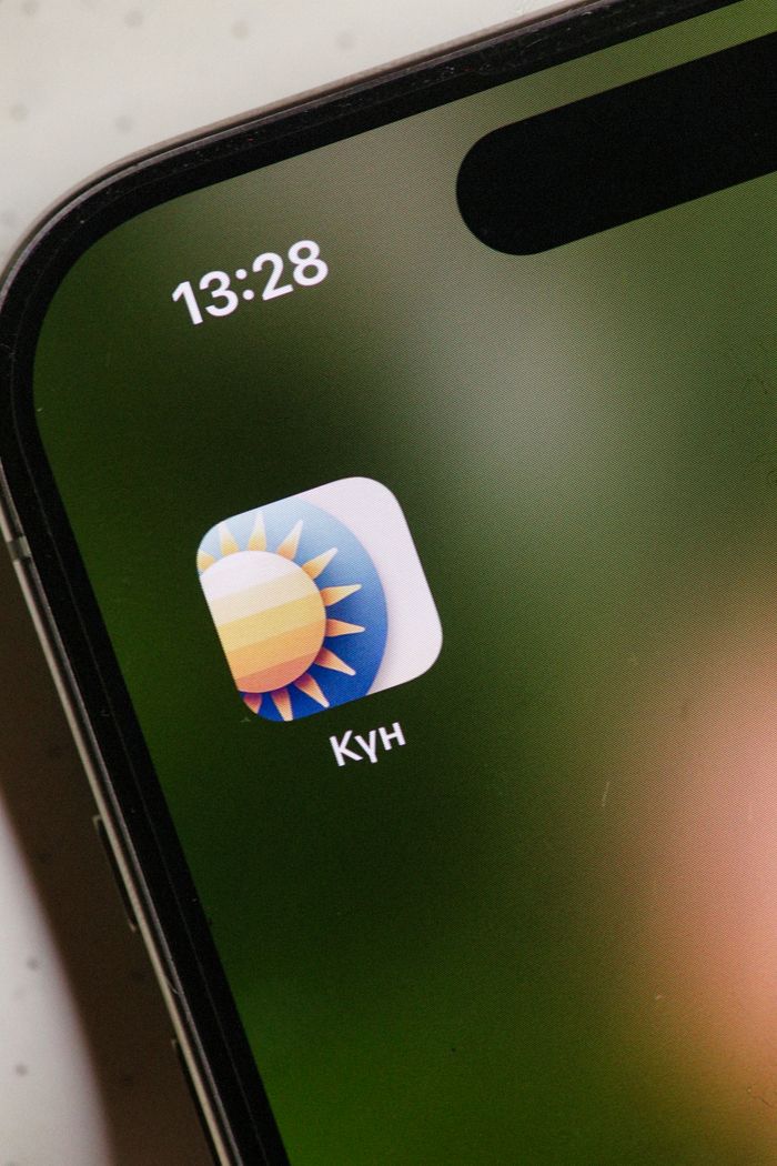 Home Smartphone screen showing a weather app icon and time display.